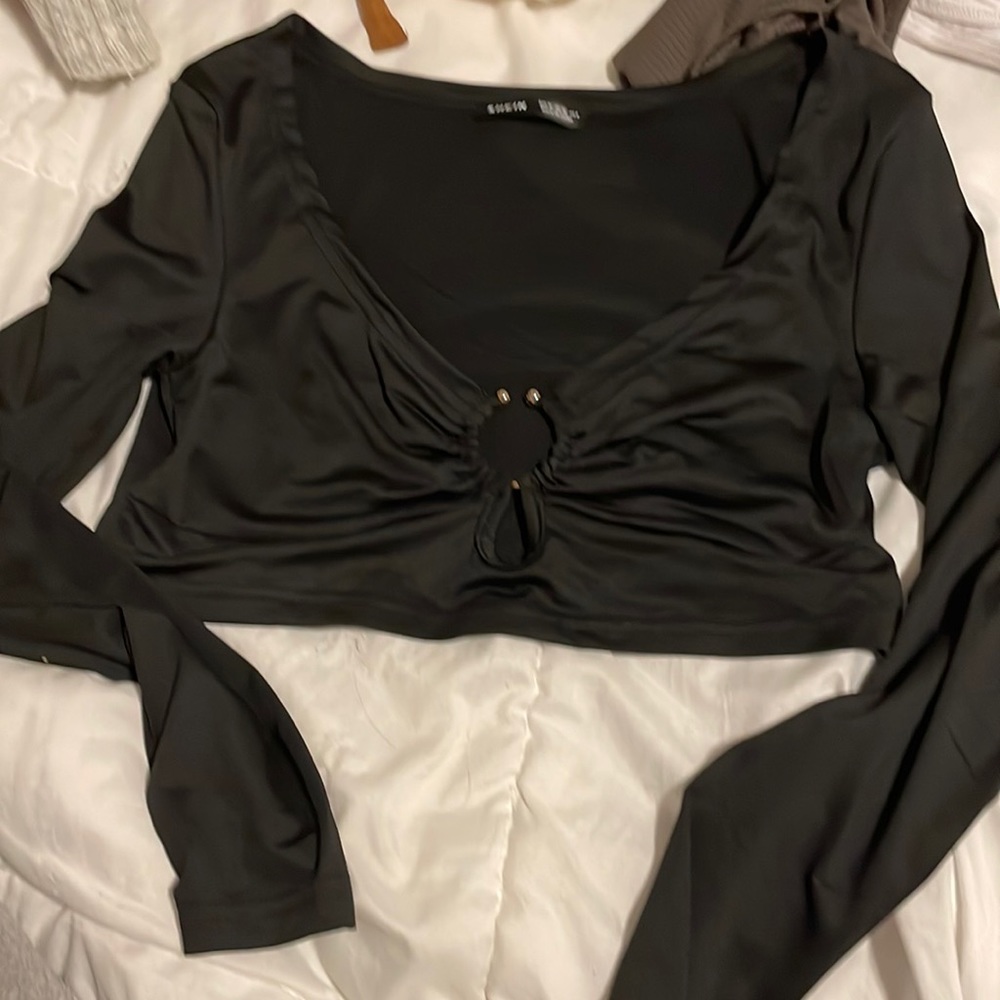 long sleeve black shirt with gold hoop